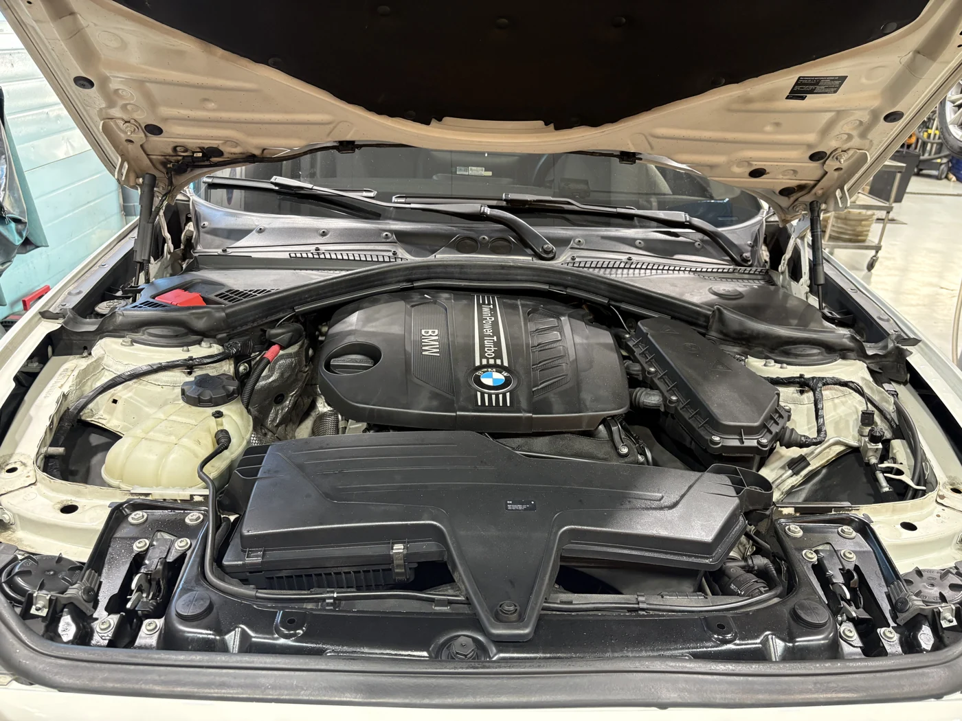 BMW 120d engine bay inspection