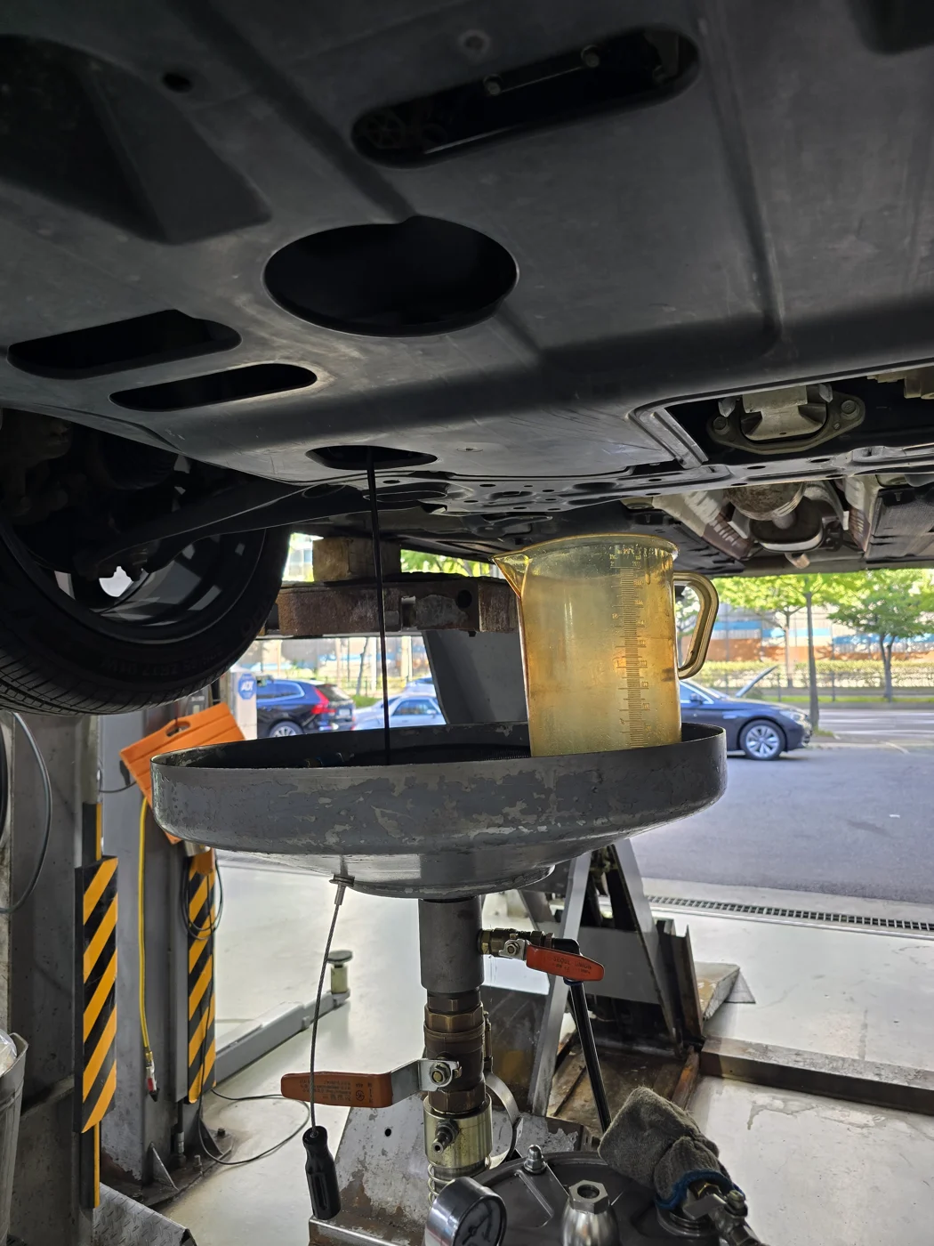 Draining the old engine oil