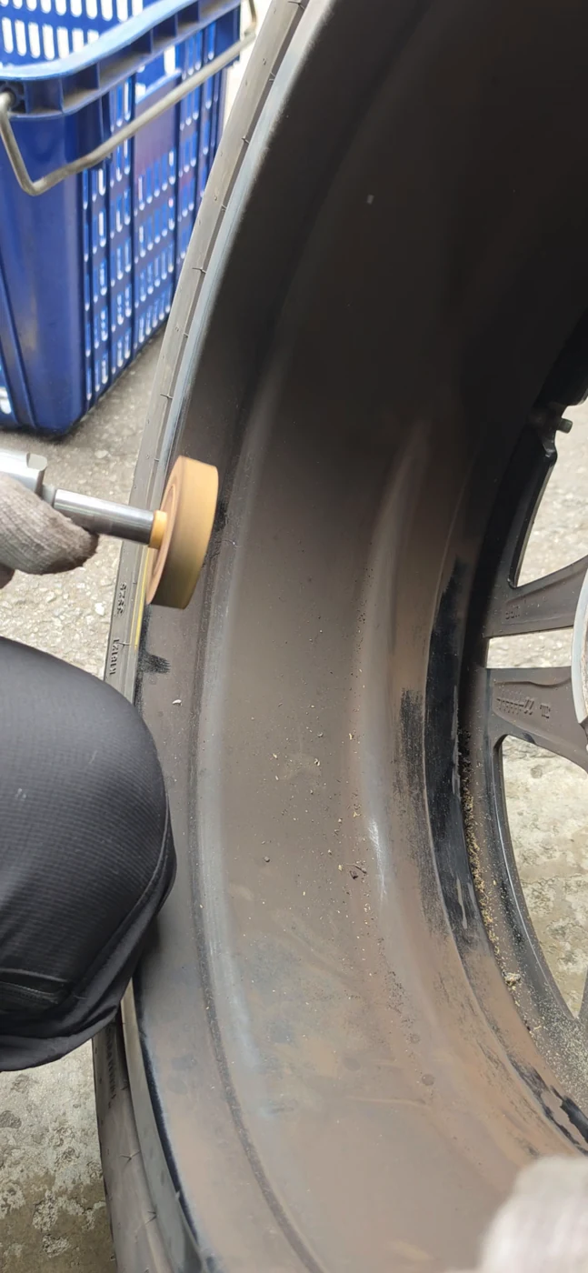 Removing residue inside the wheel. Frame from this CLA workshop video.