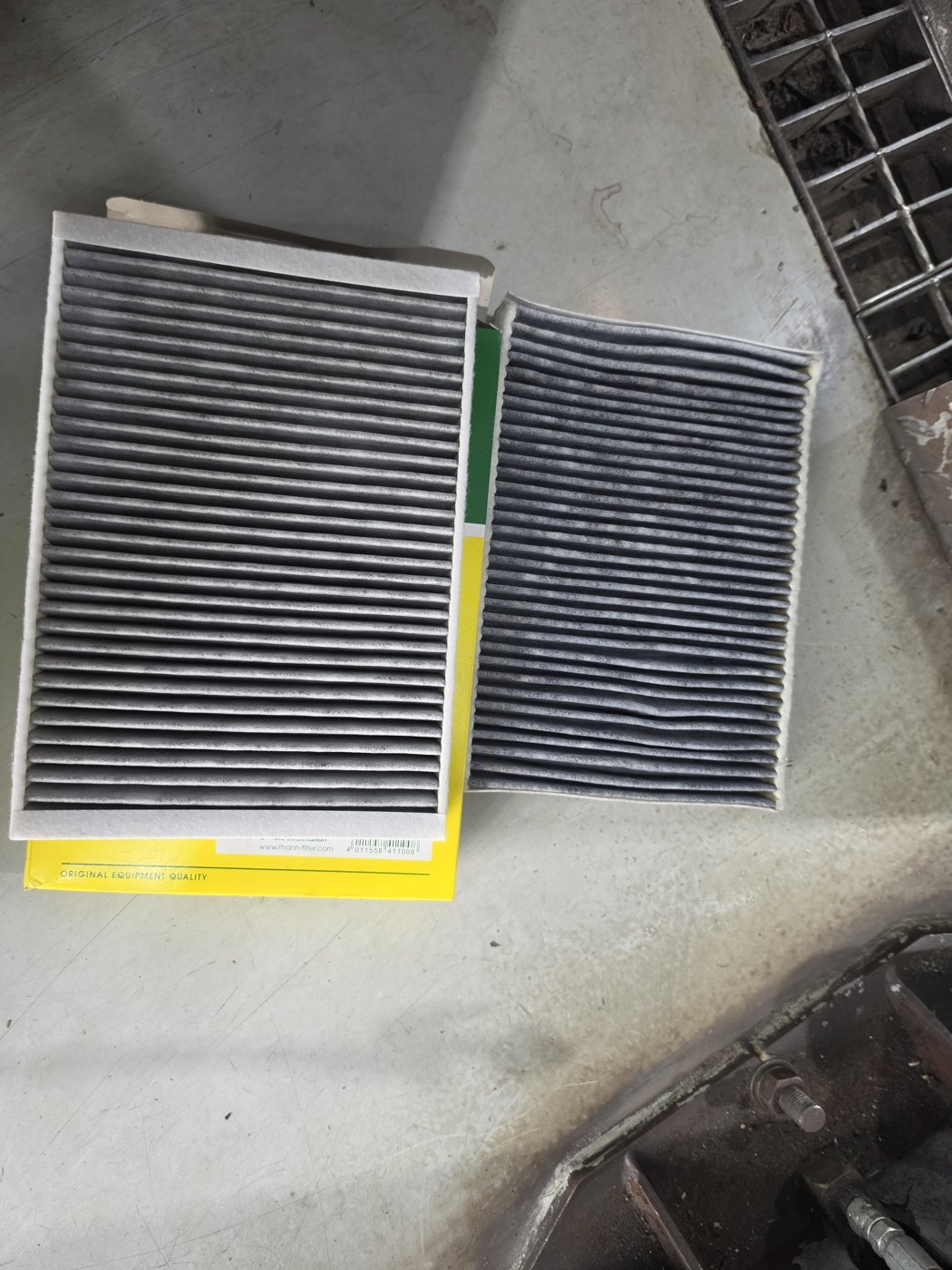 Old cabin filter next to the new filter.