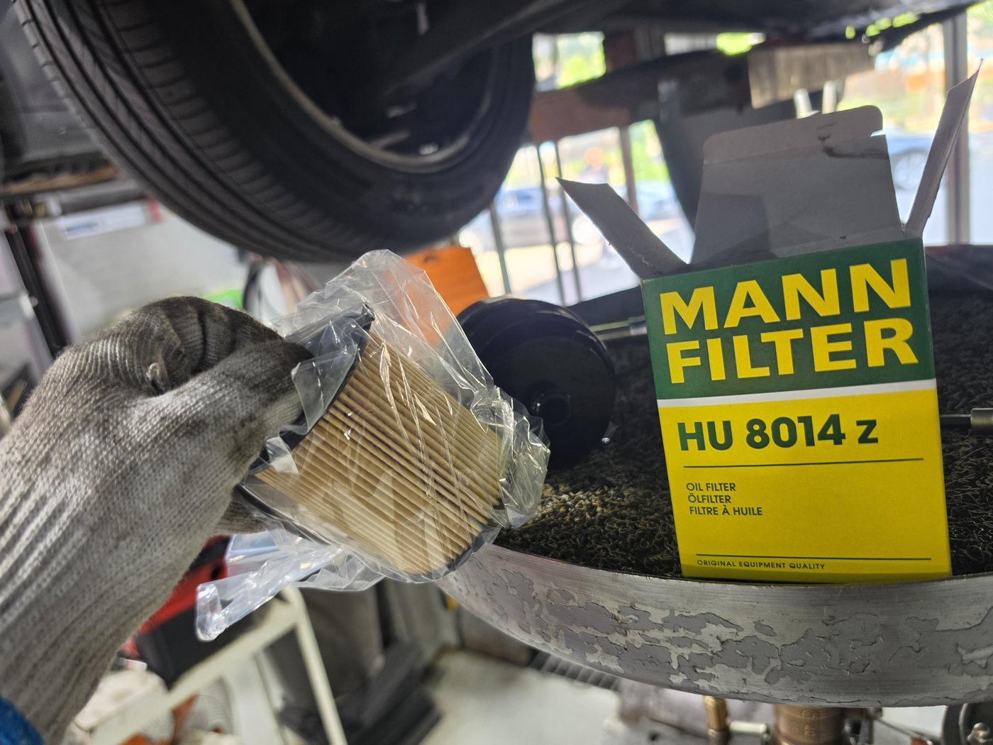 New oil filter used for the engine oil service.