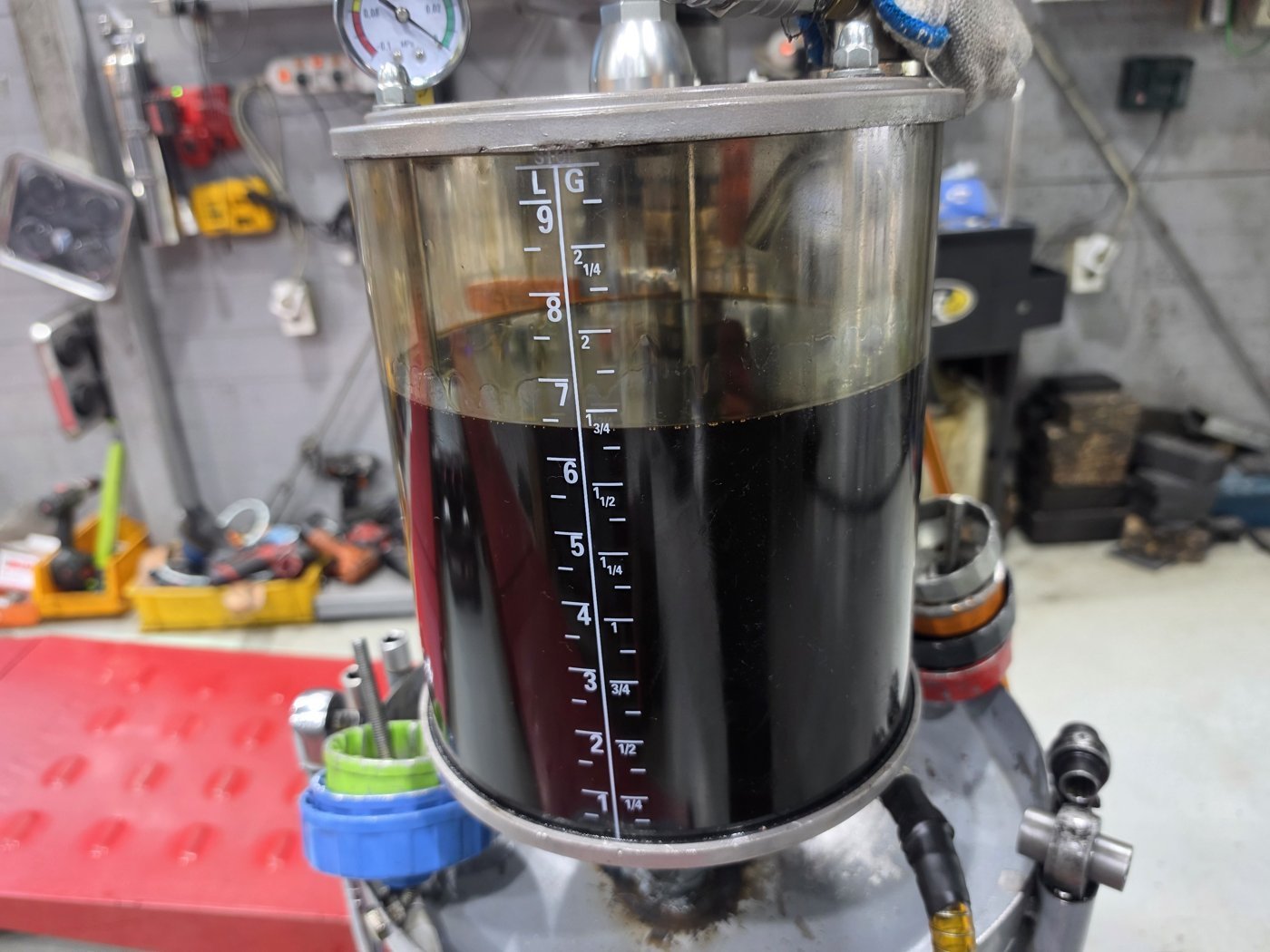 The drained engine oil.