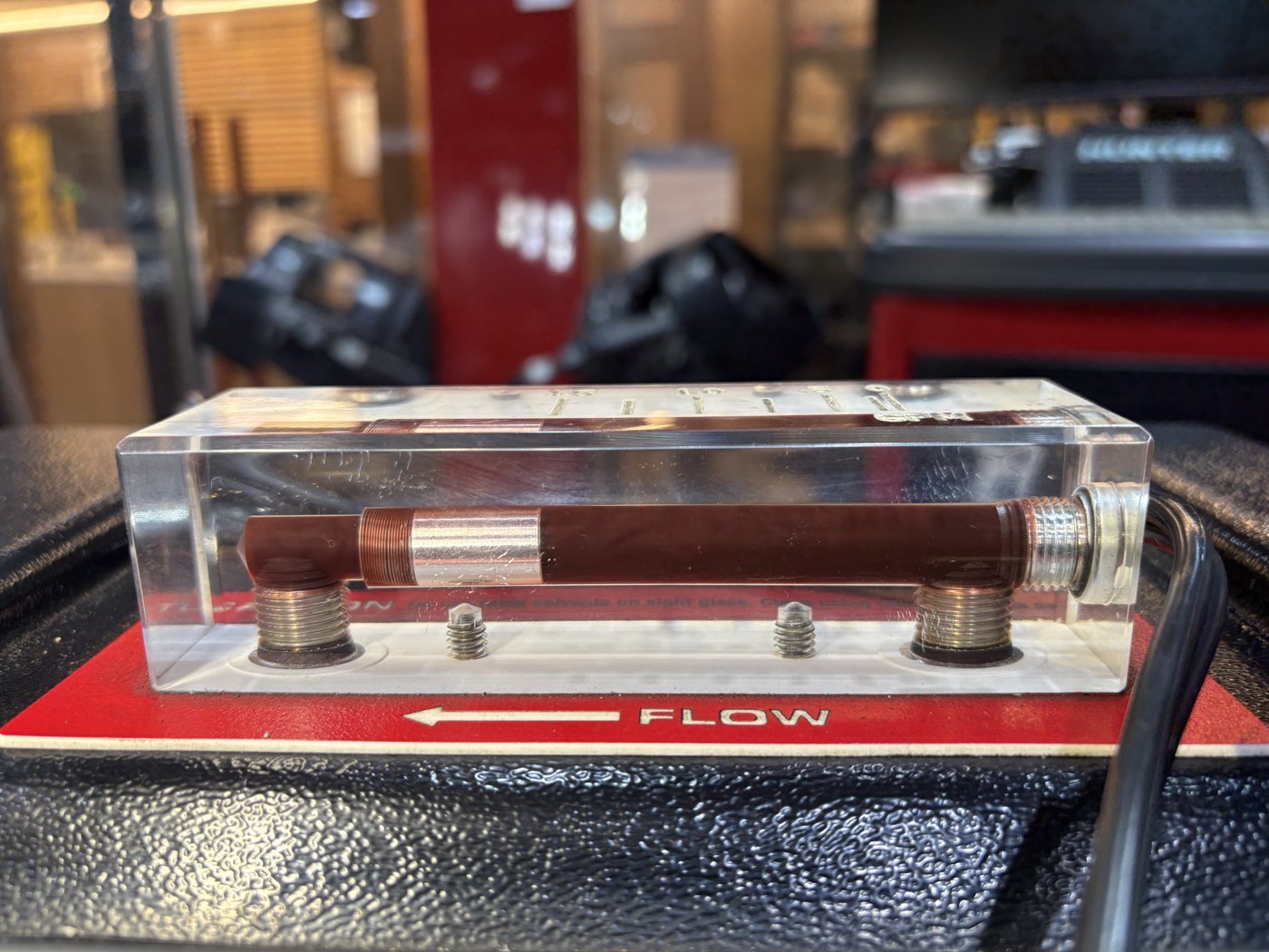 Fluid flow seen through the exchange machine's sight glass.