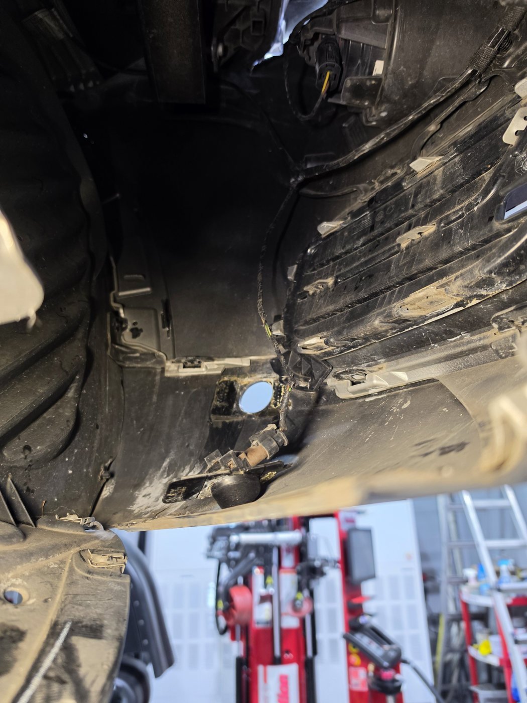 Checking the underside of the car