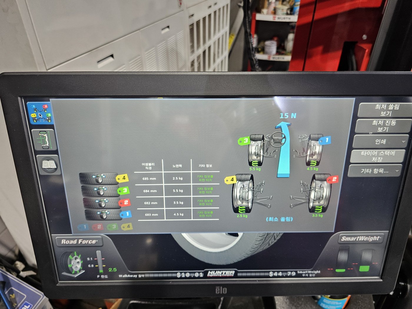 Machine screen measuring each wheel and tire by position
