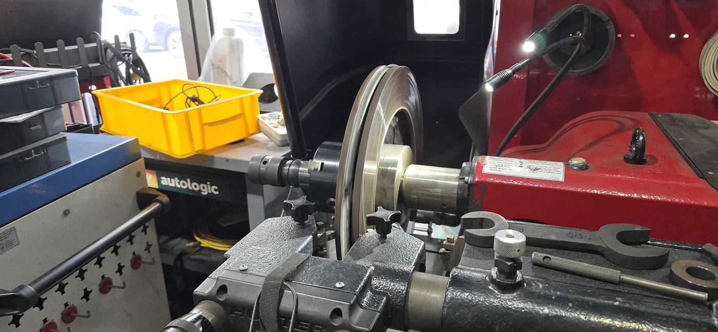 Brake disc refinishing on the lathe.
