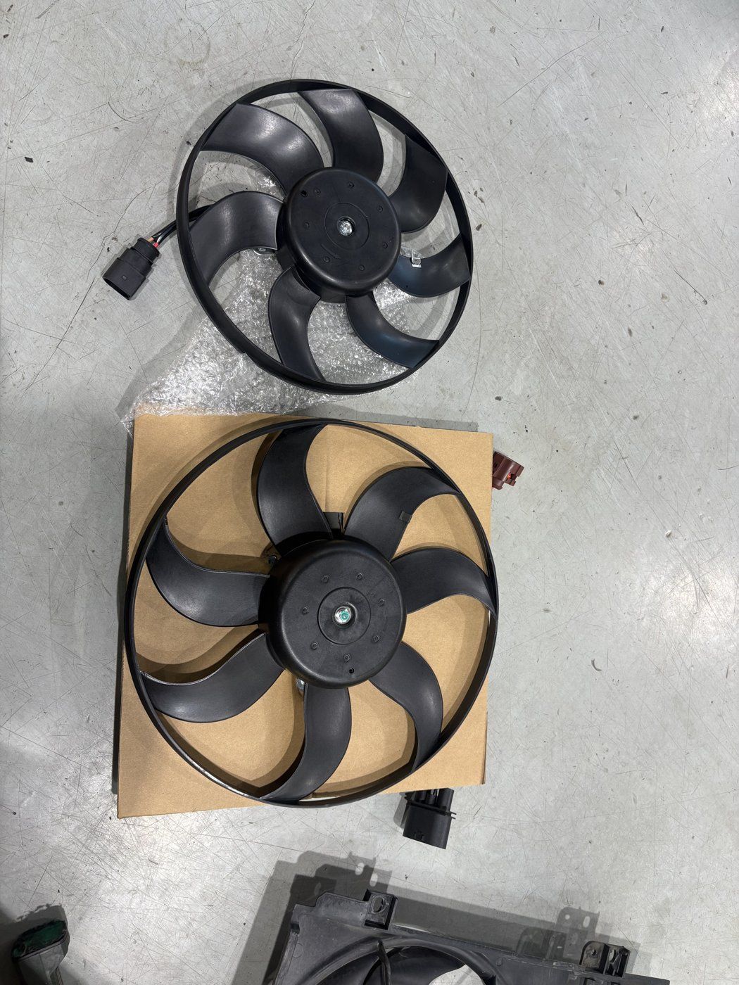 Removed and new cooling fans