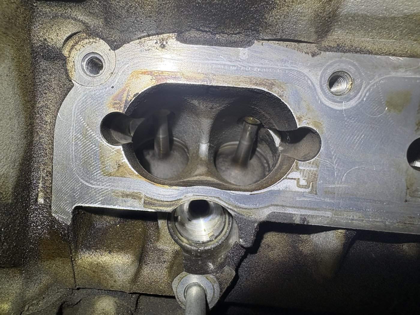 Intake passage with bare metal exposed after walnut blasting