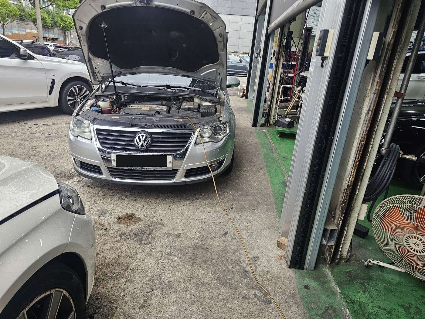 2009 Volkswagen Passat in for intake flap and cooling fan repair and valve carbon removal