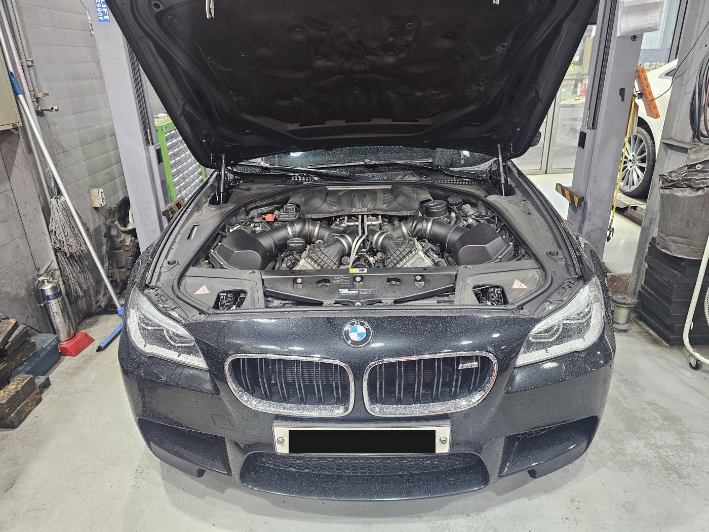 2013 BMW M5 in for engine oil and filter and rear differential oil replacement