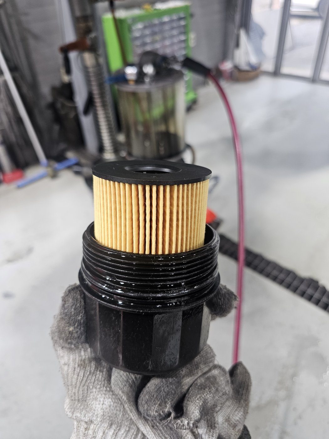 New engine oil filter fitted in the housing