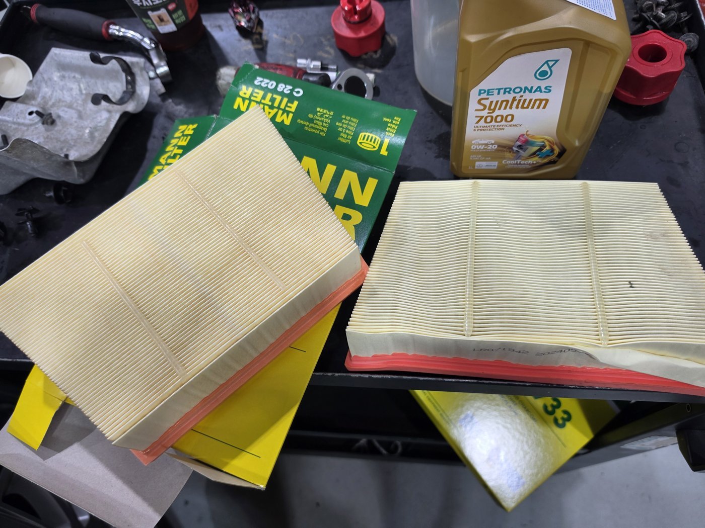Old air filter compared with the new one
