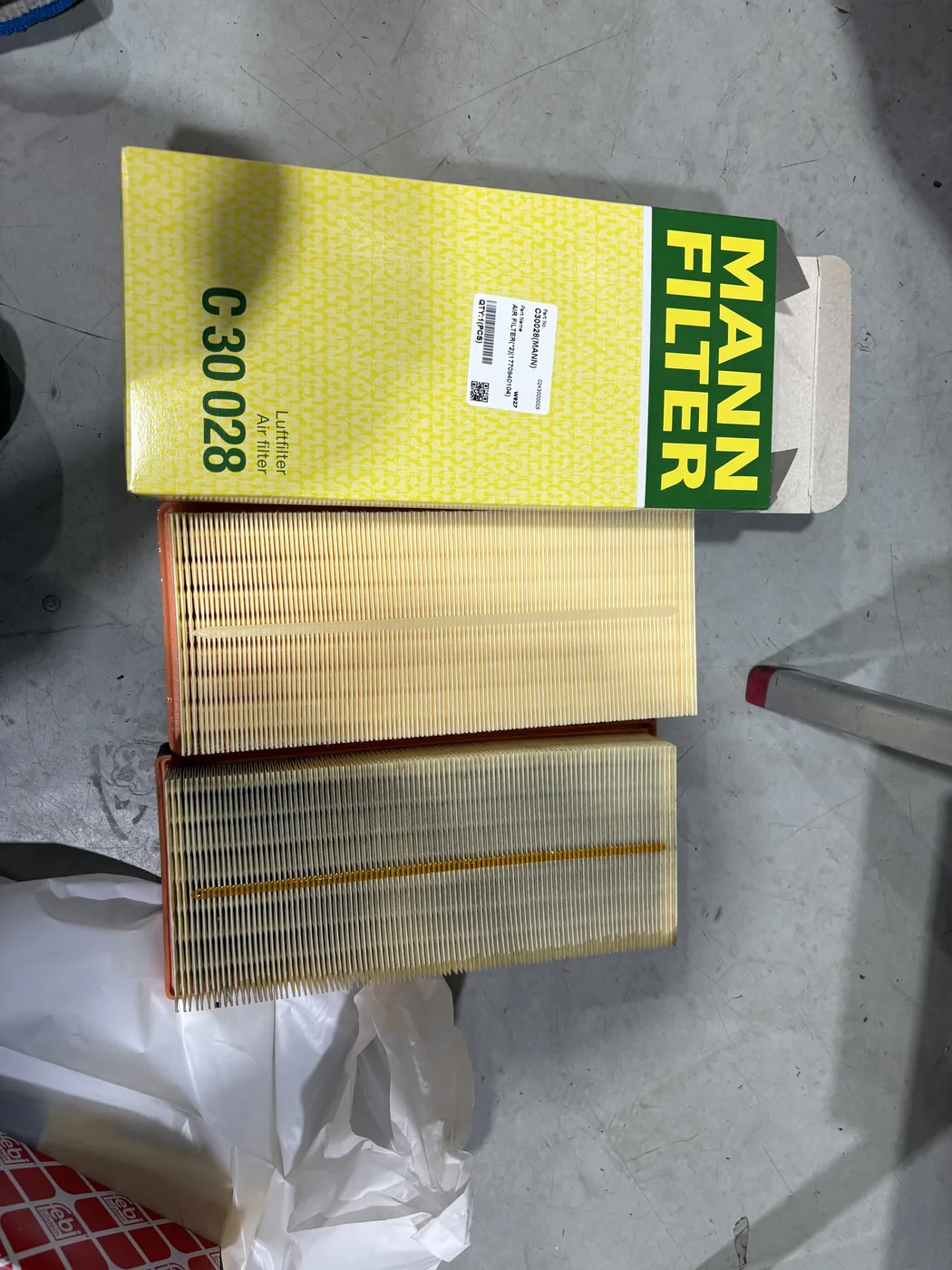 Removed engine air filter and new MANN replacement