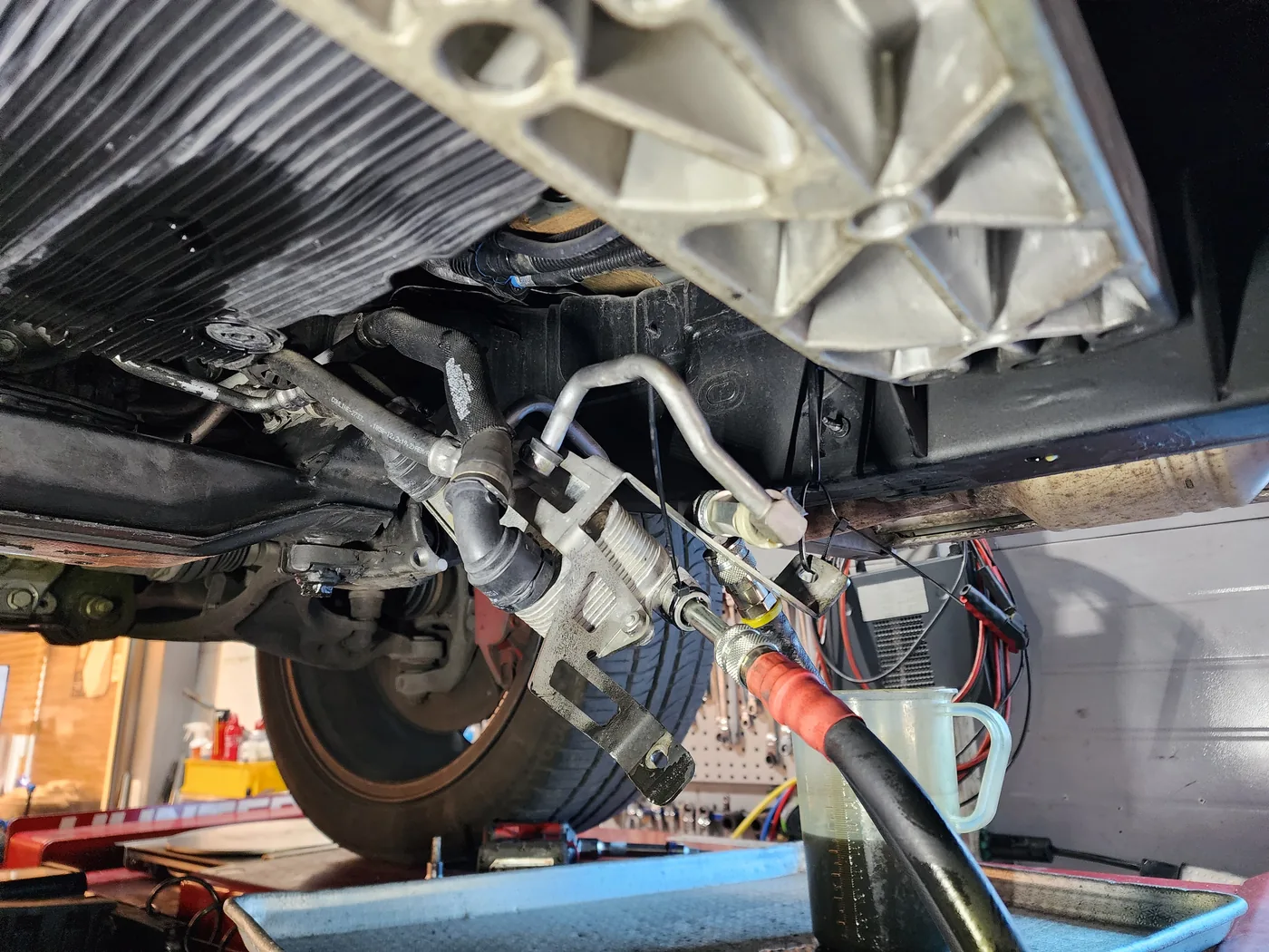 Transmission fluid exchange equipment connected beneath the G63