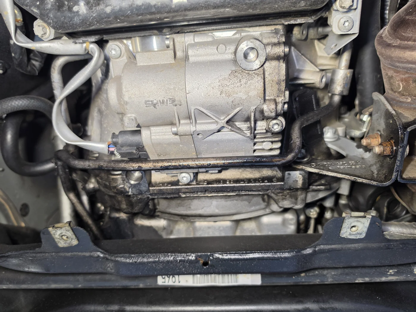 Underbody oil traces before cleaning