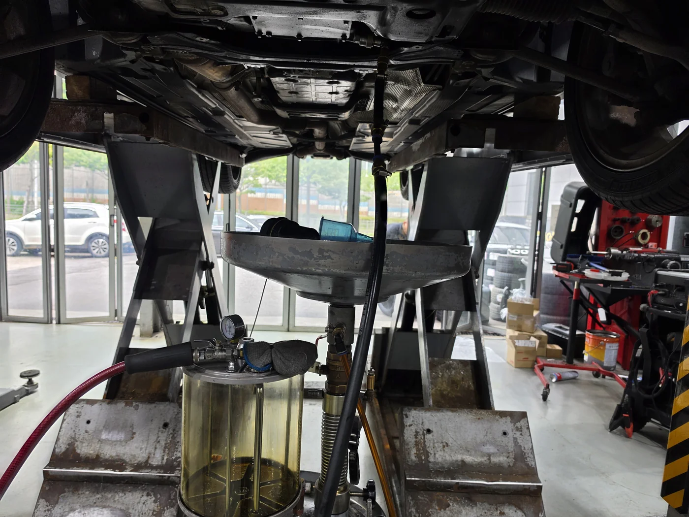 Draining engine oil
