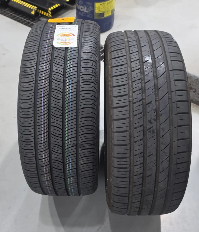 The Genesis OE-specification Continental replacement tyre alongside the previous tyre.