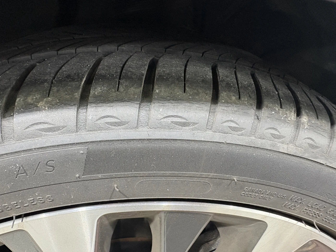 Inspection of the old tyre tread and cracking.