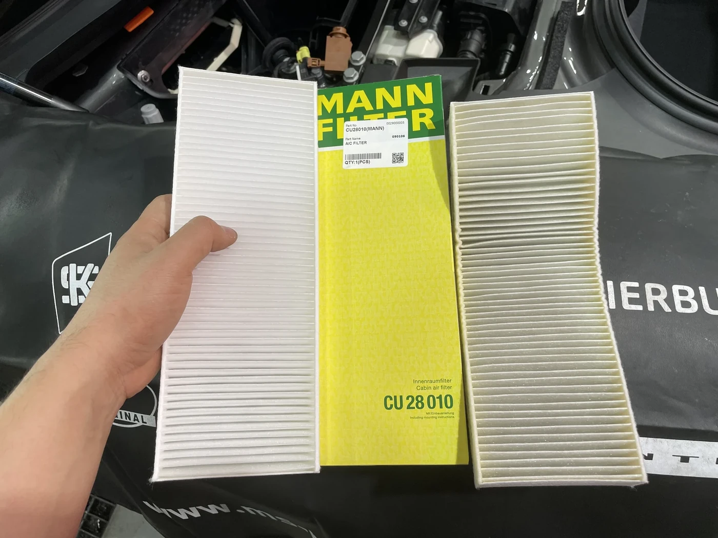 Old and new front luggage compartment filters