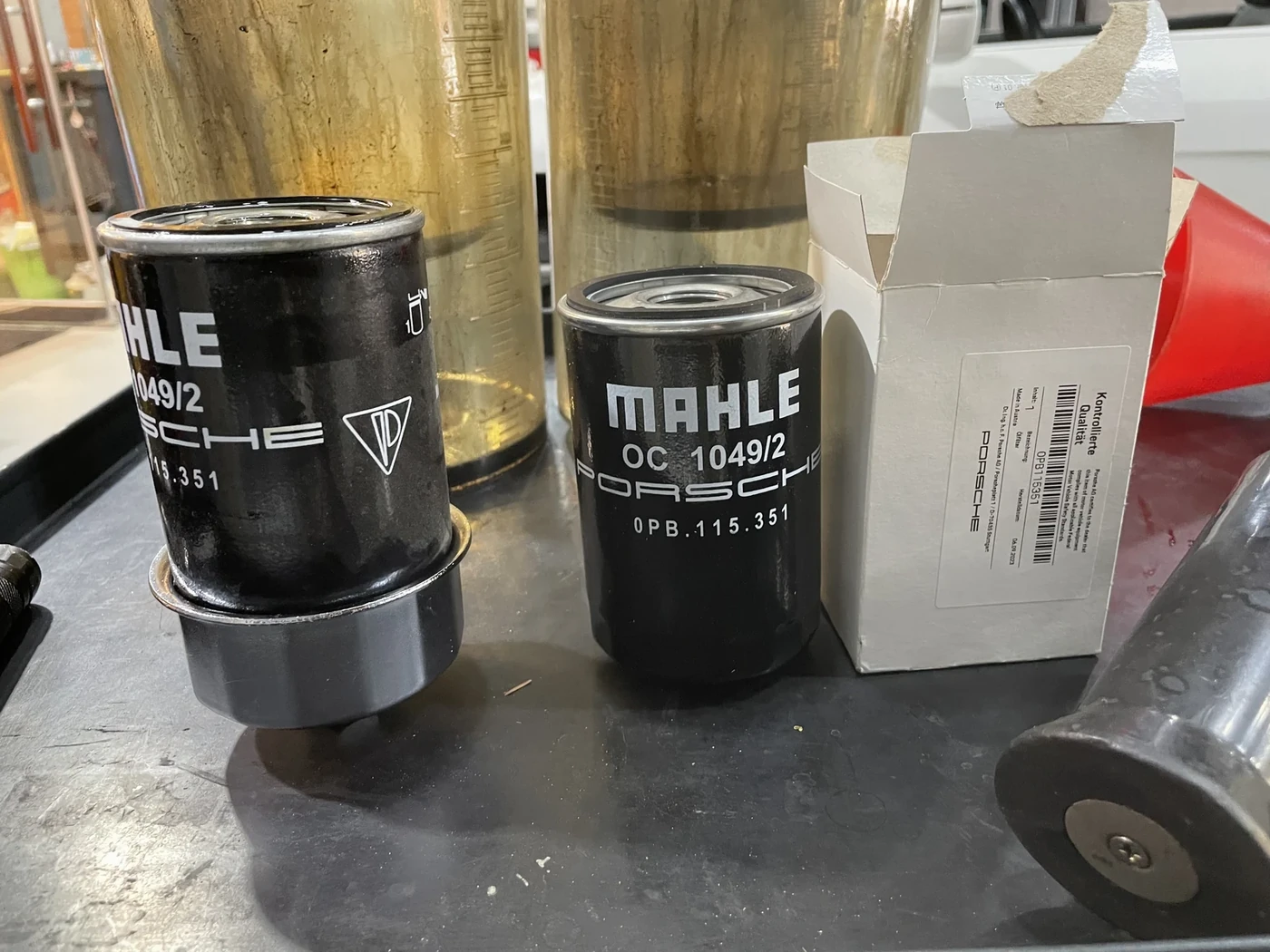 Removed oil filter and replacement filter