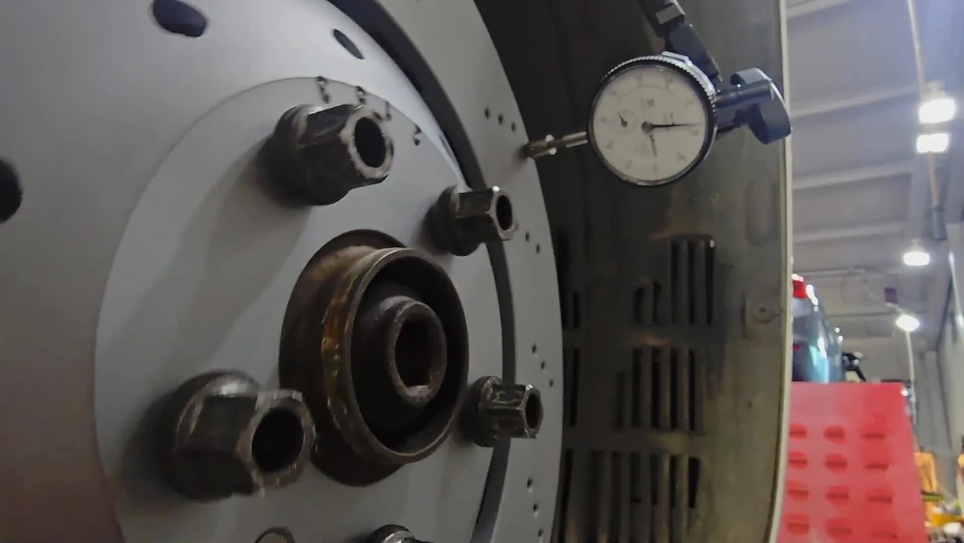 Later brake service · Measuring assembled disc runout with a dial gauge