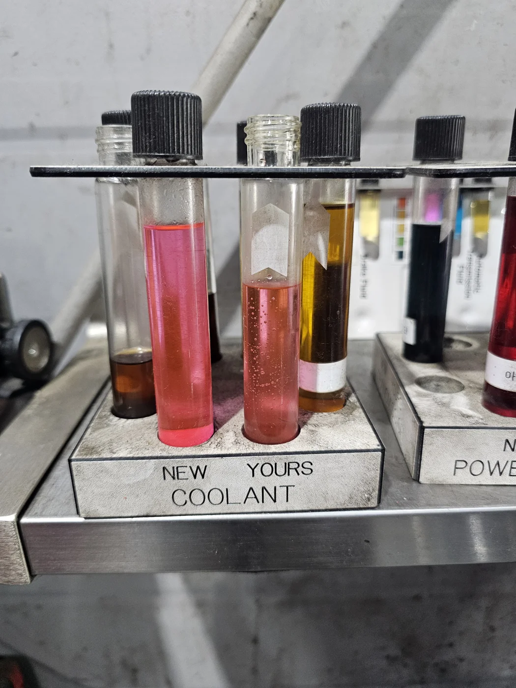 Fresh coolant and a sample from the vehicle