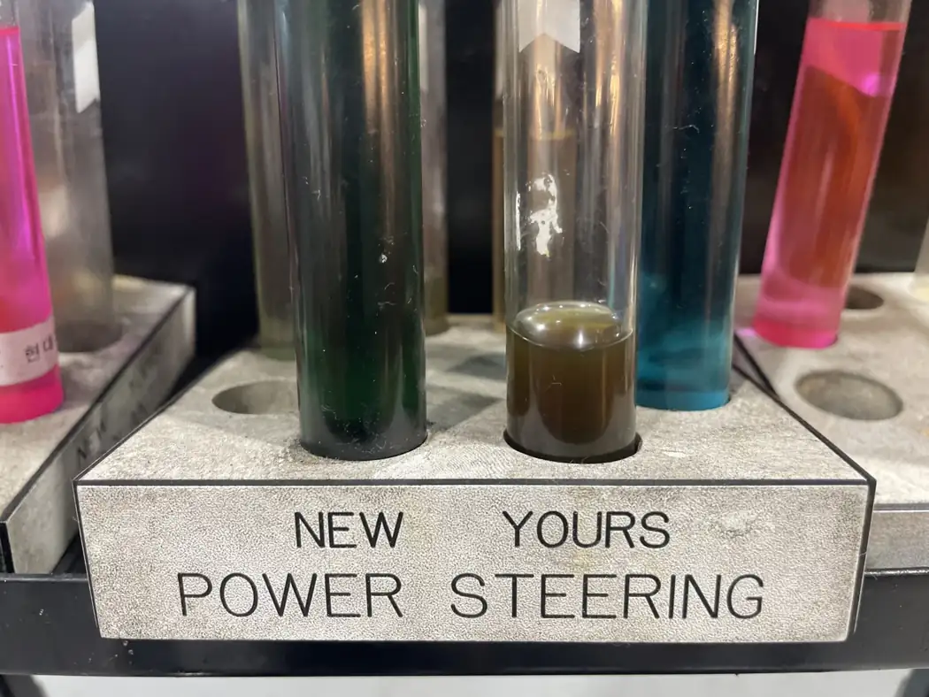 Fresh and used power-steering fluid